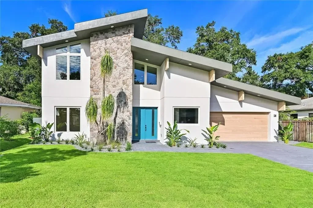 Christy Avenue custom home — organic abode exterior, Winter Park FL